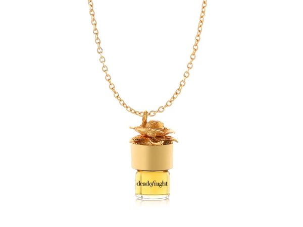 Strange Love Perfumed Oil Necklace 1.25ml with 24-inch chain featuring exotic oud and rose notes ##