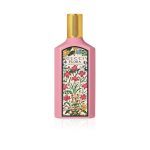 Gucci Flora Gorgeous Gardenia Eau de Parfum 100ml bottle with floral design and pink liquid